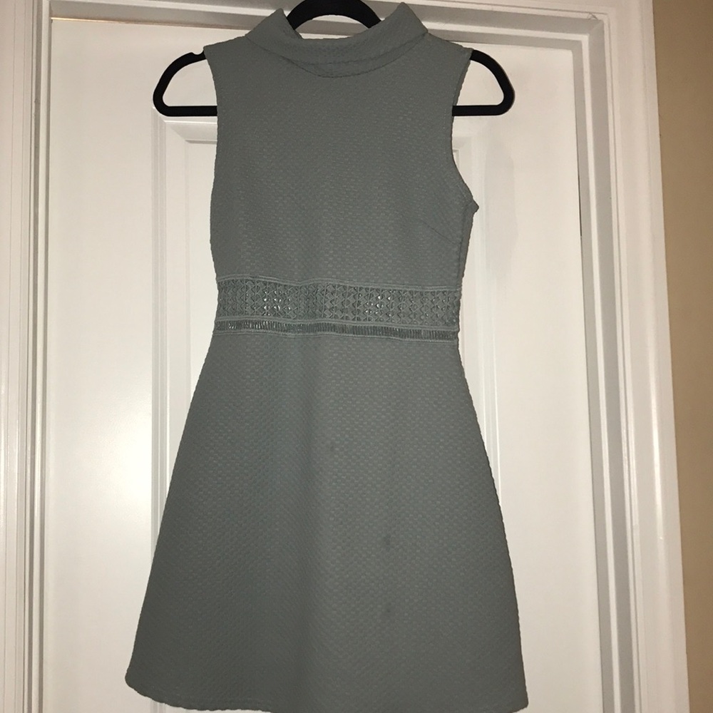 Light blue sleeveless dress with cutouts
